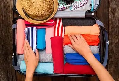 Comment gagner de la place dans sa valise : 10 techniques testées et comparées - BagSlim